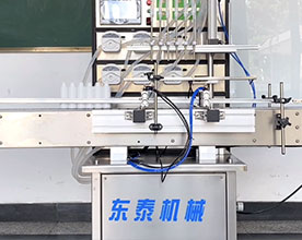 <b>6頭液體灌裝機(jī)+四輪搓蓋機(jī)</b>